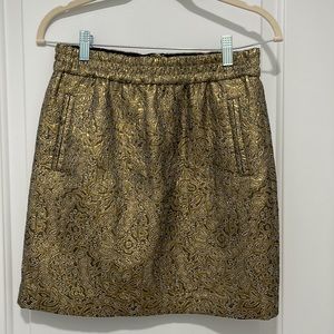 Gold mini skirt